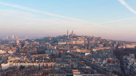 Paris-rooftops-aerial-sunset-with-the-Basilica-of-the-Sacred-Heart-pollution